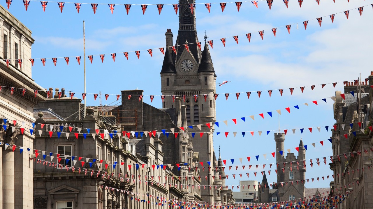 Flags and bunting decorating Union Street in Aberdeen, Scotland