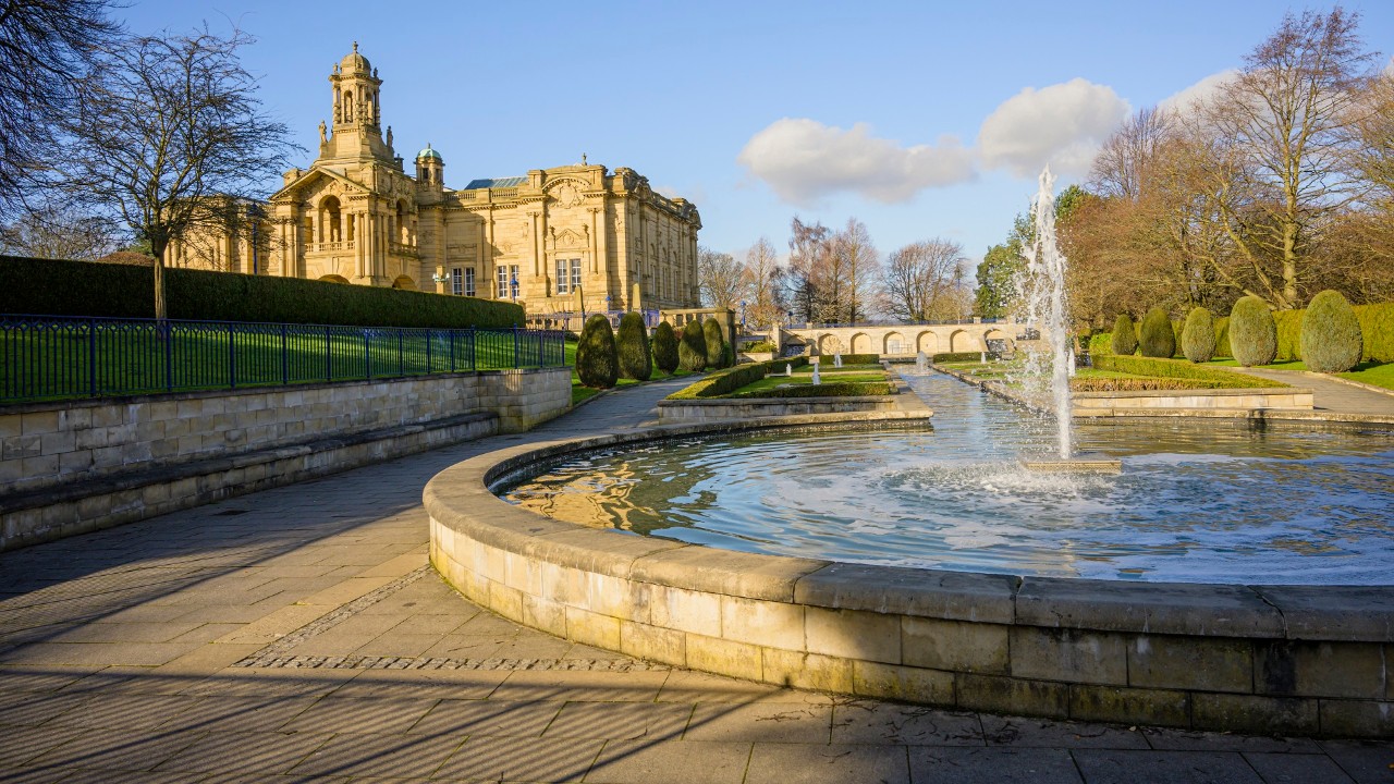 Cartwright Hall in Lister park, Bradford, Yorkshire viewed from the Mughal water gardens.